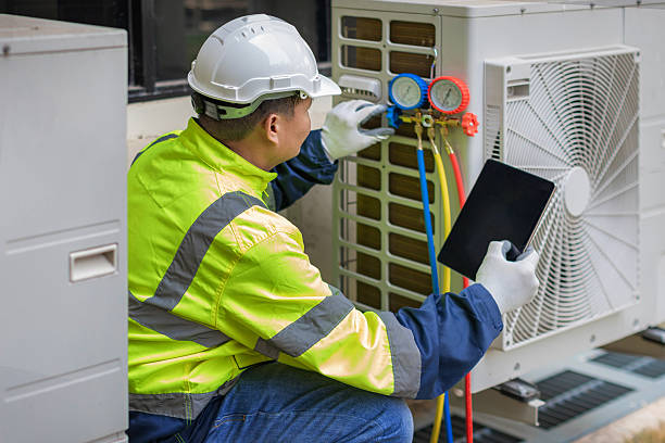 Professional Air Conditioning Repair technician working in Amherst, NH